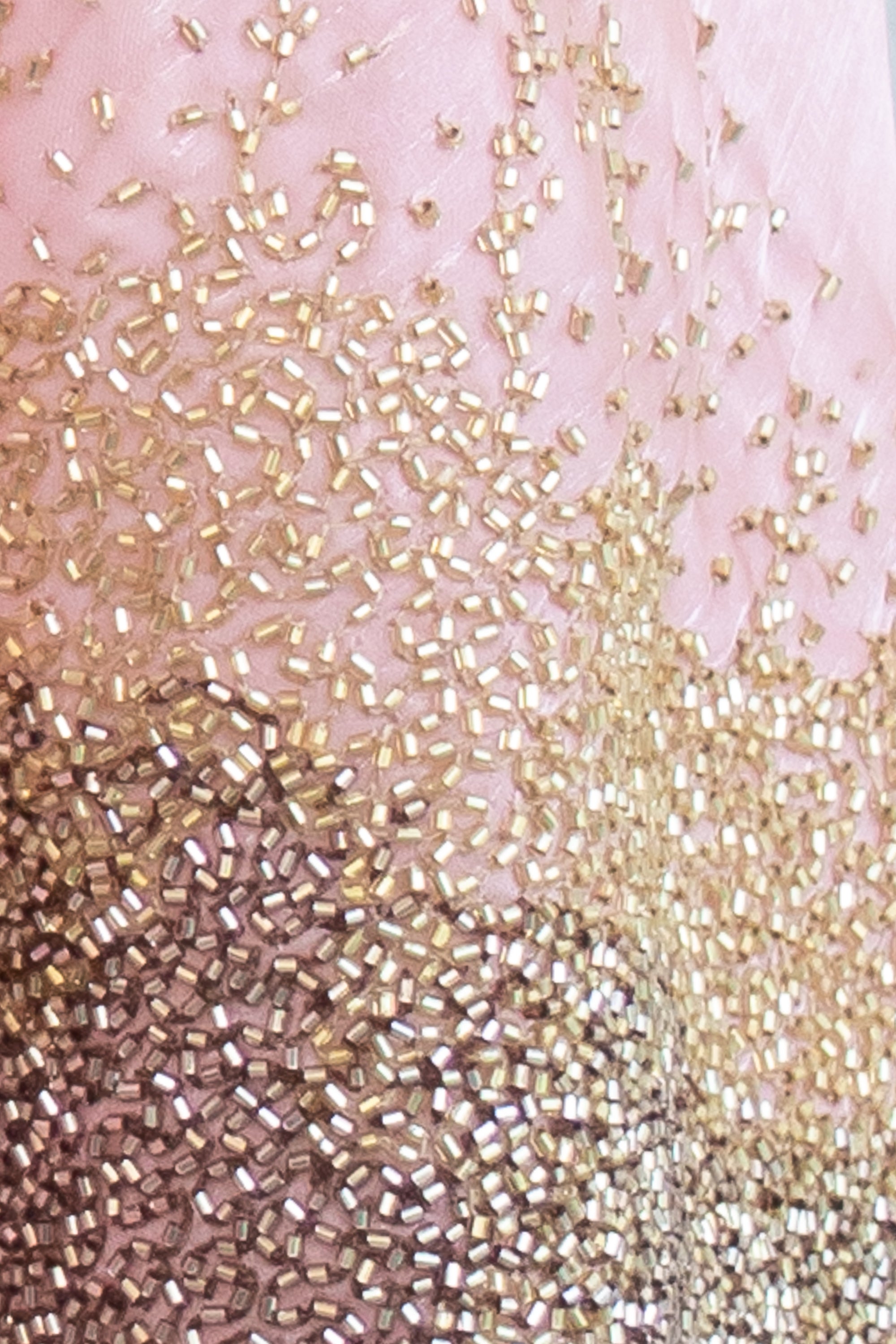 close up of Formal pastel pink organza Zerith Cape with refined gold beadwork for special celebrations
