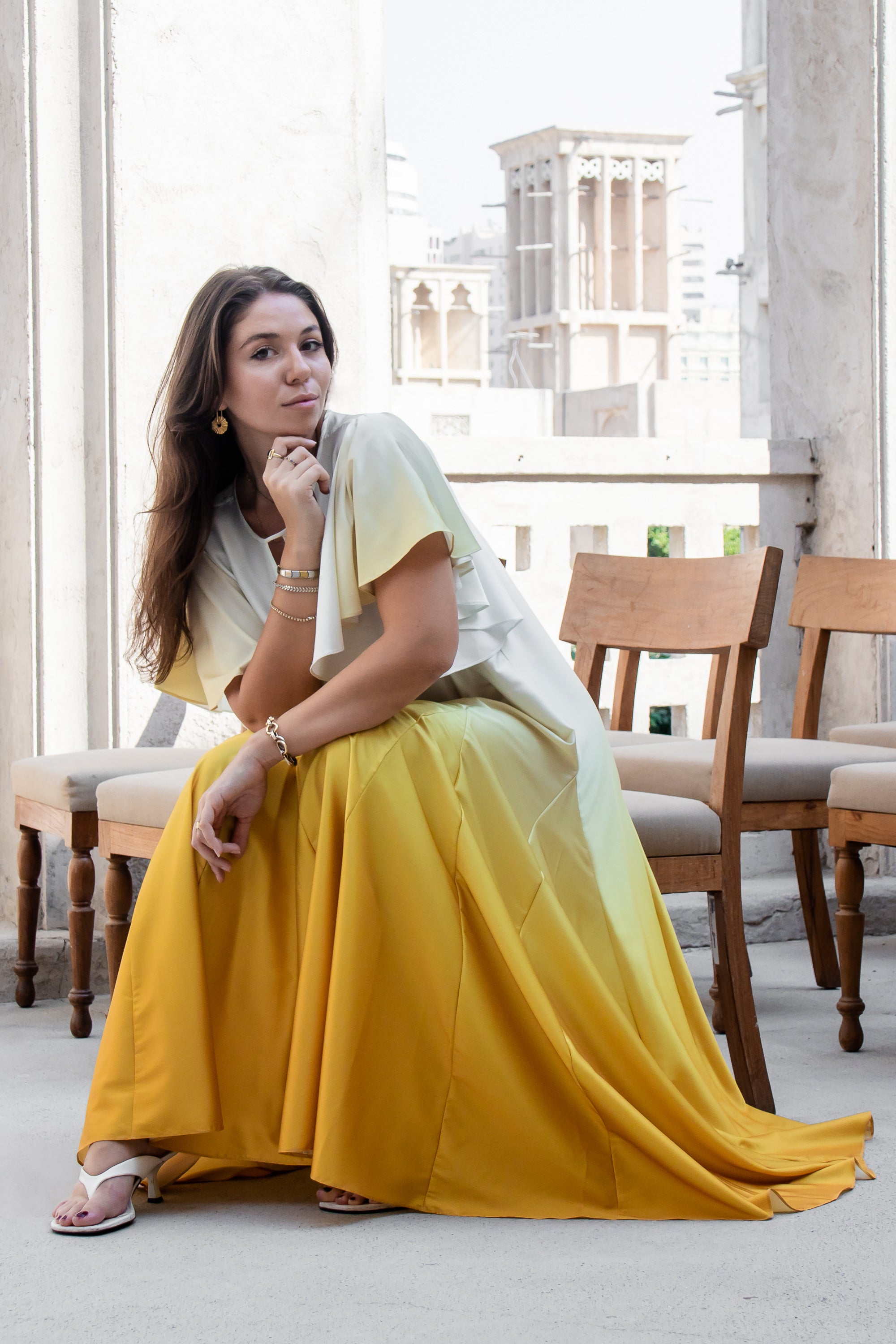 Elegant yellow ombré Nourah Dress showcasing flowing fabric and modest, sophisticated design
