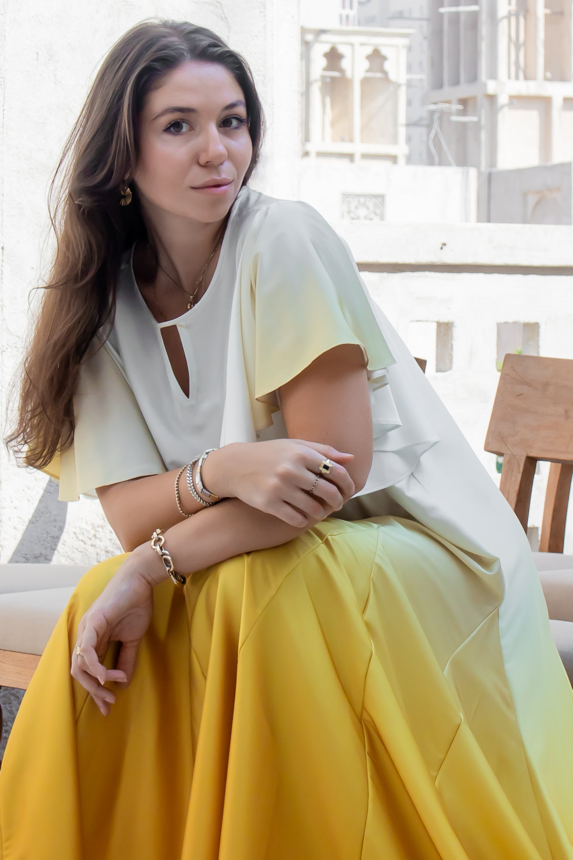Flowing Nourah Dress in yellow ombré with soft flare and graceful movement for festive events
