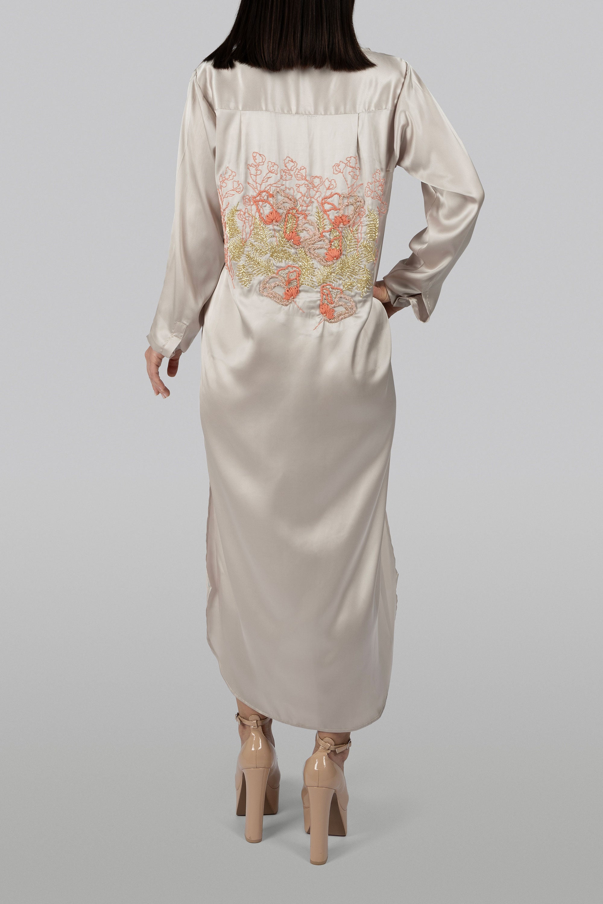 Poppy silk shirt dress with lustrous finish and embroidered floral motifs
