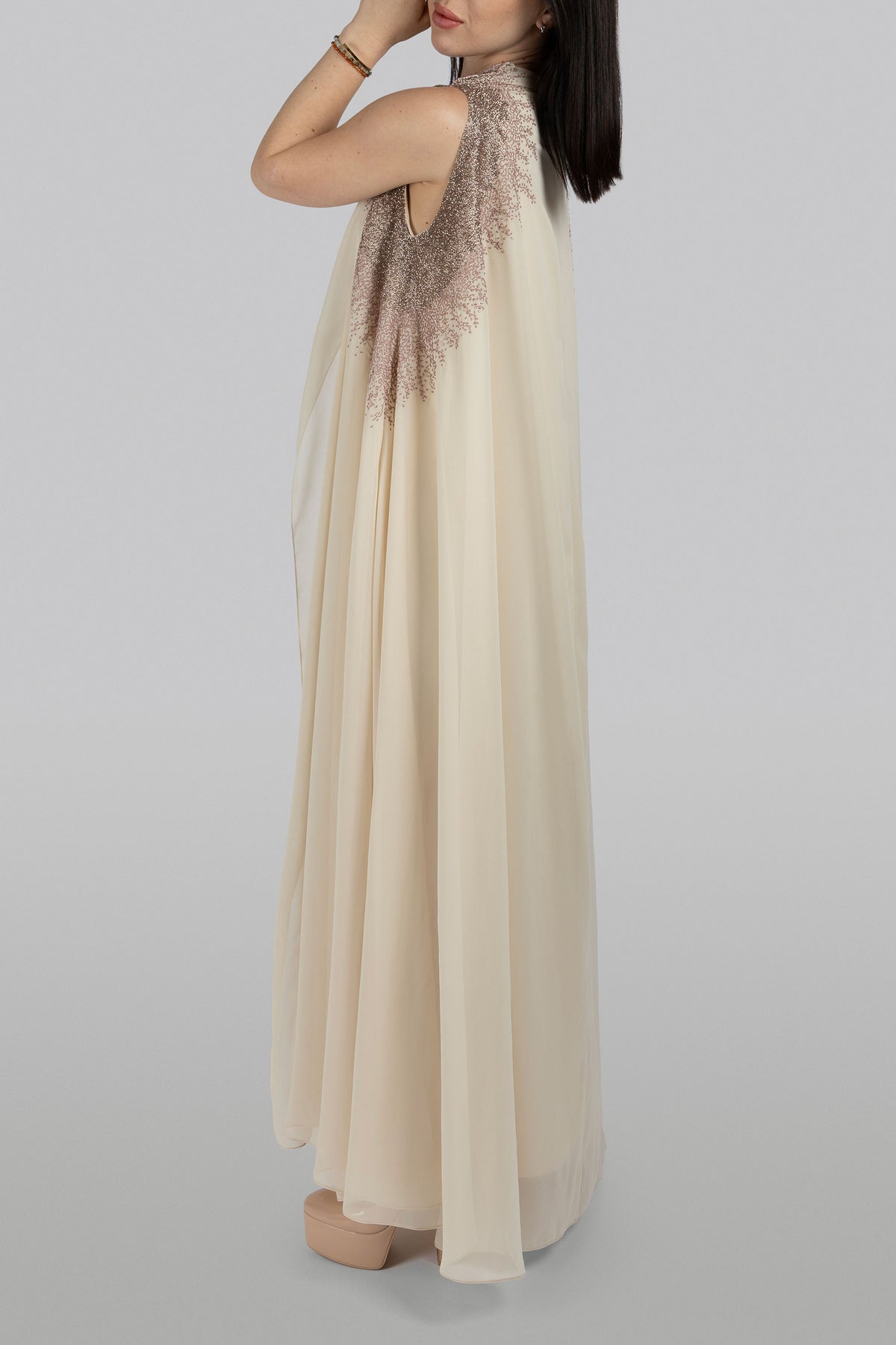 
Thalia cape set with fluid silhouette and subtle hand-applied details
