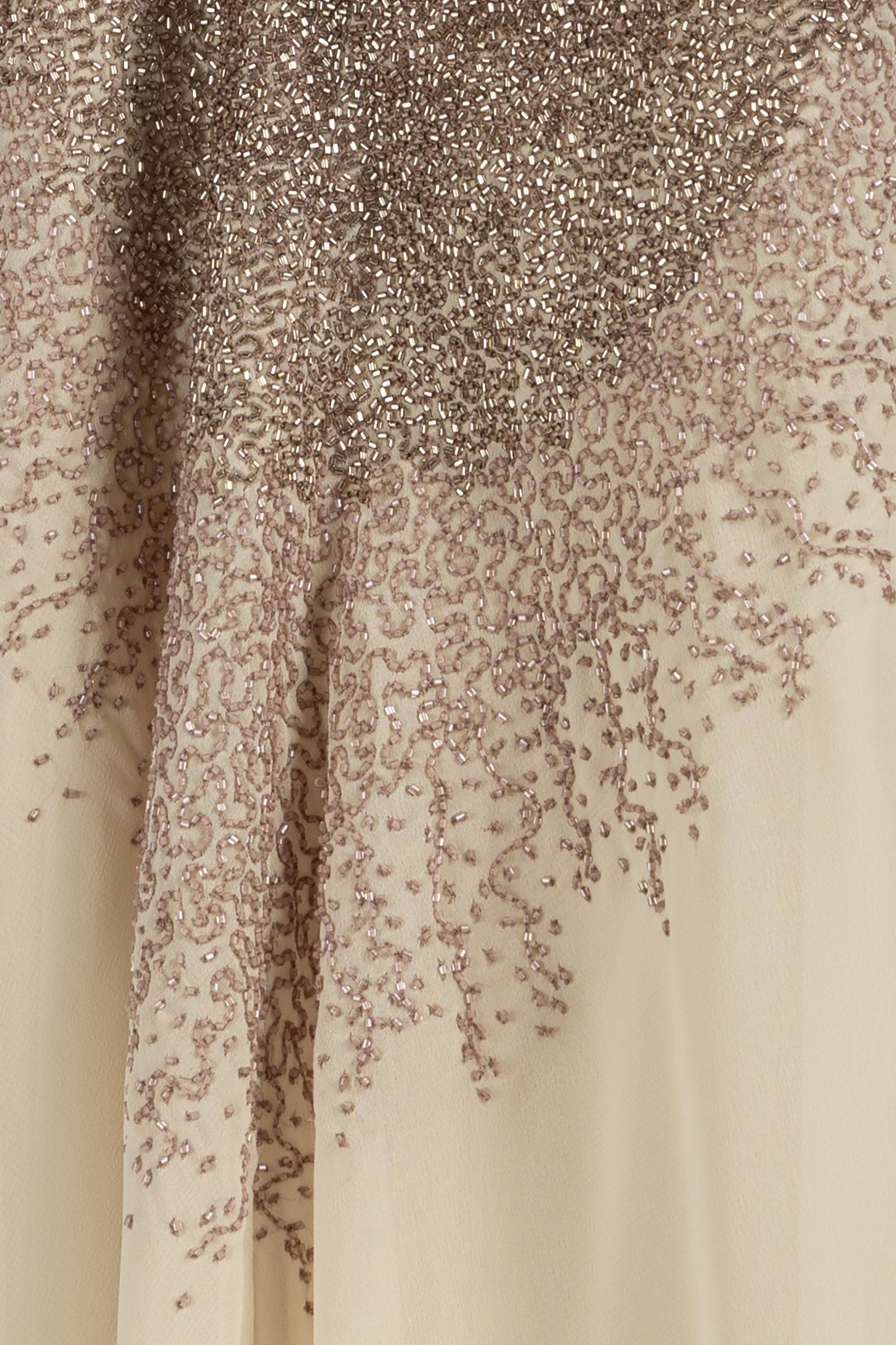 Close-up of antique hand-embroidered beadwork on thalia chiffon cape by KUNST UAE
