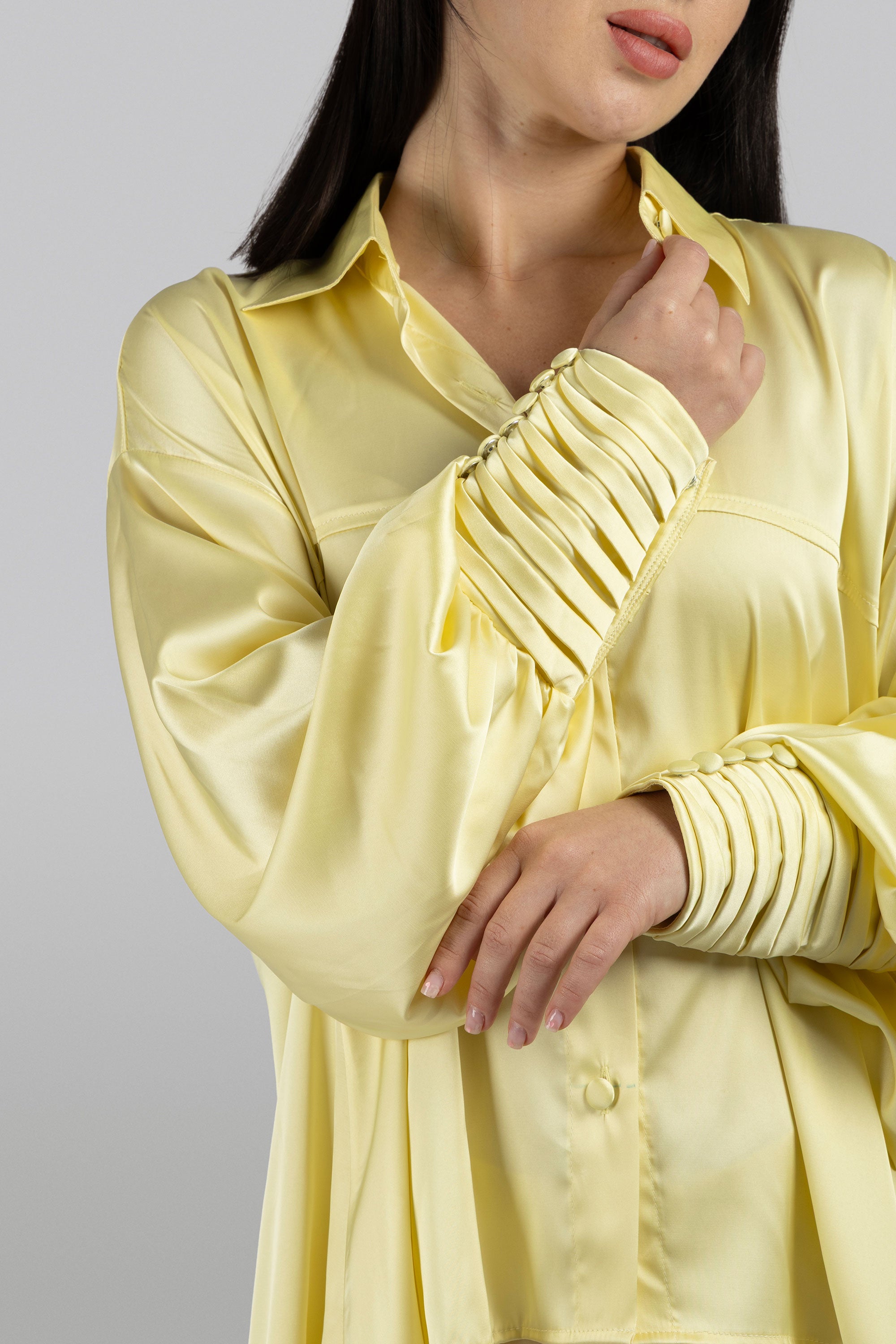 Opal asymmetric silk top with voluminous sleeves and refined details
