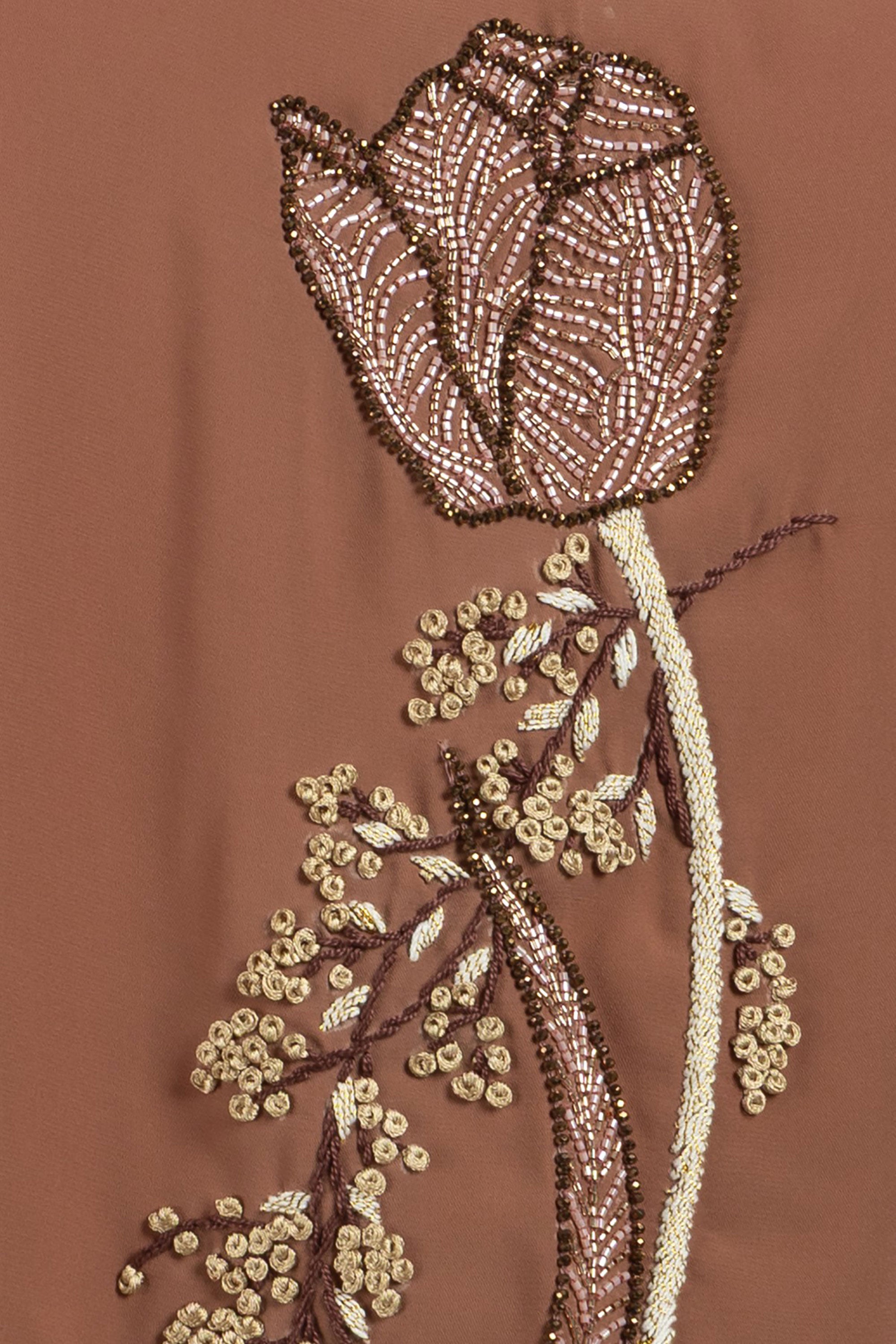 close up of Tulip motif crepe top with sophisticated relaxed fit
