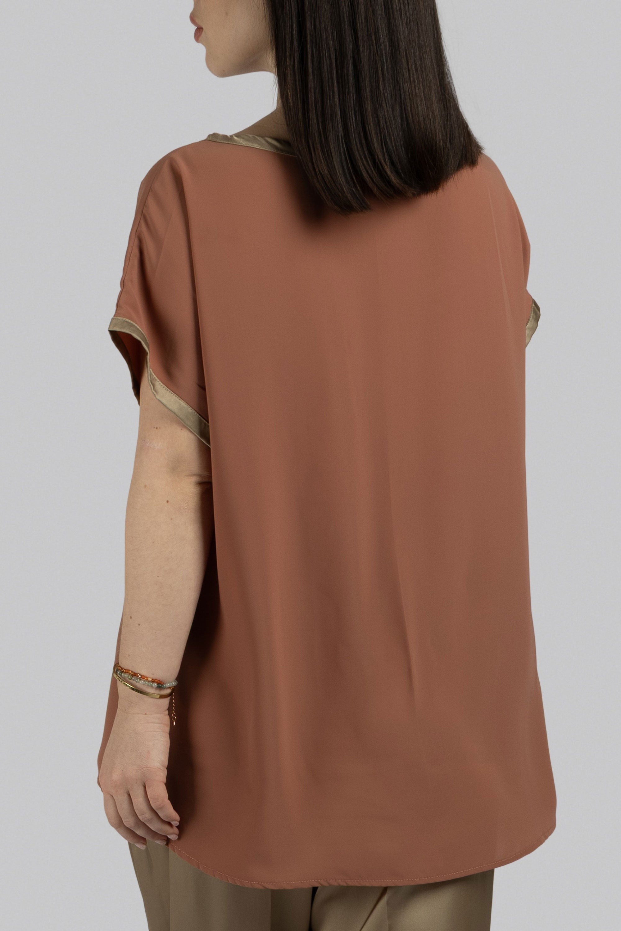 Luxury modest top with hand-applied French knot tulip detailing

