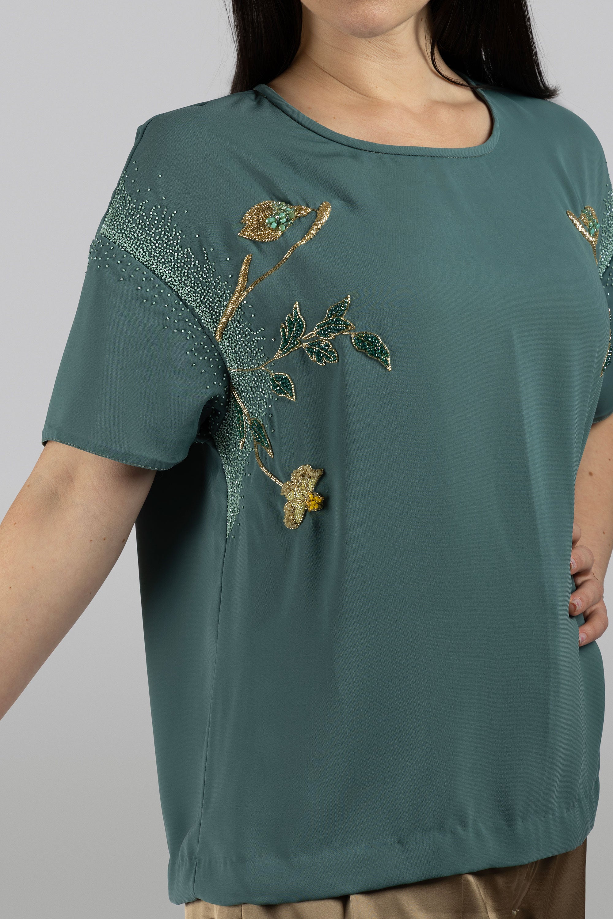 Luxury modest top with delicate hand-applied bead and crystal embellishments
