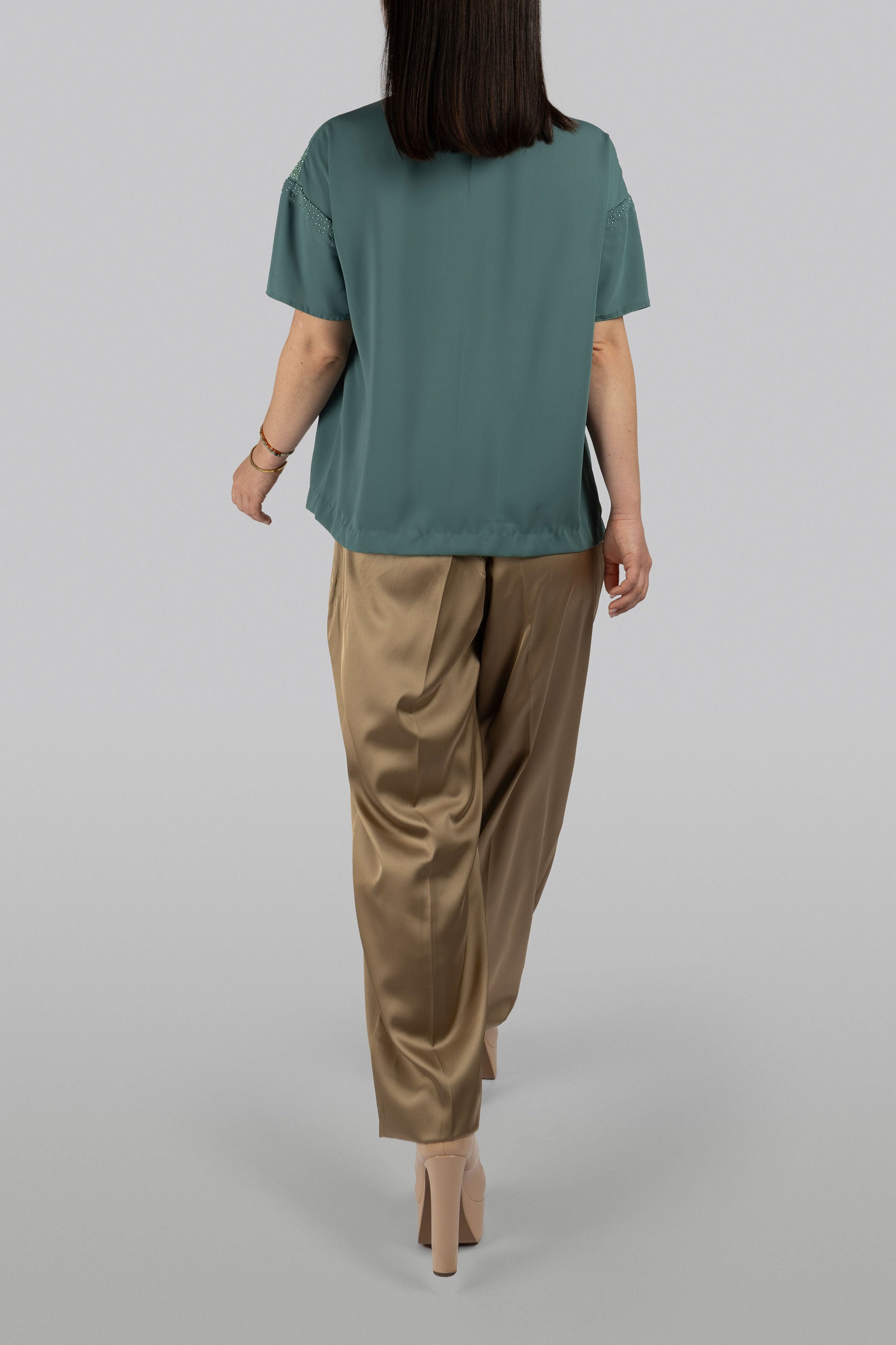 Deep sage crepe top for polished day-to-evening styling
