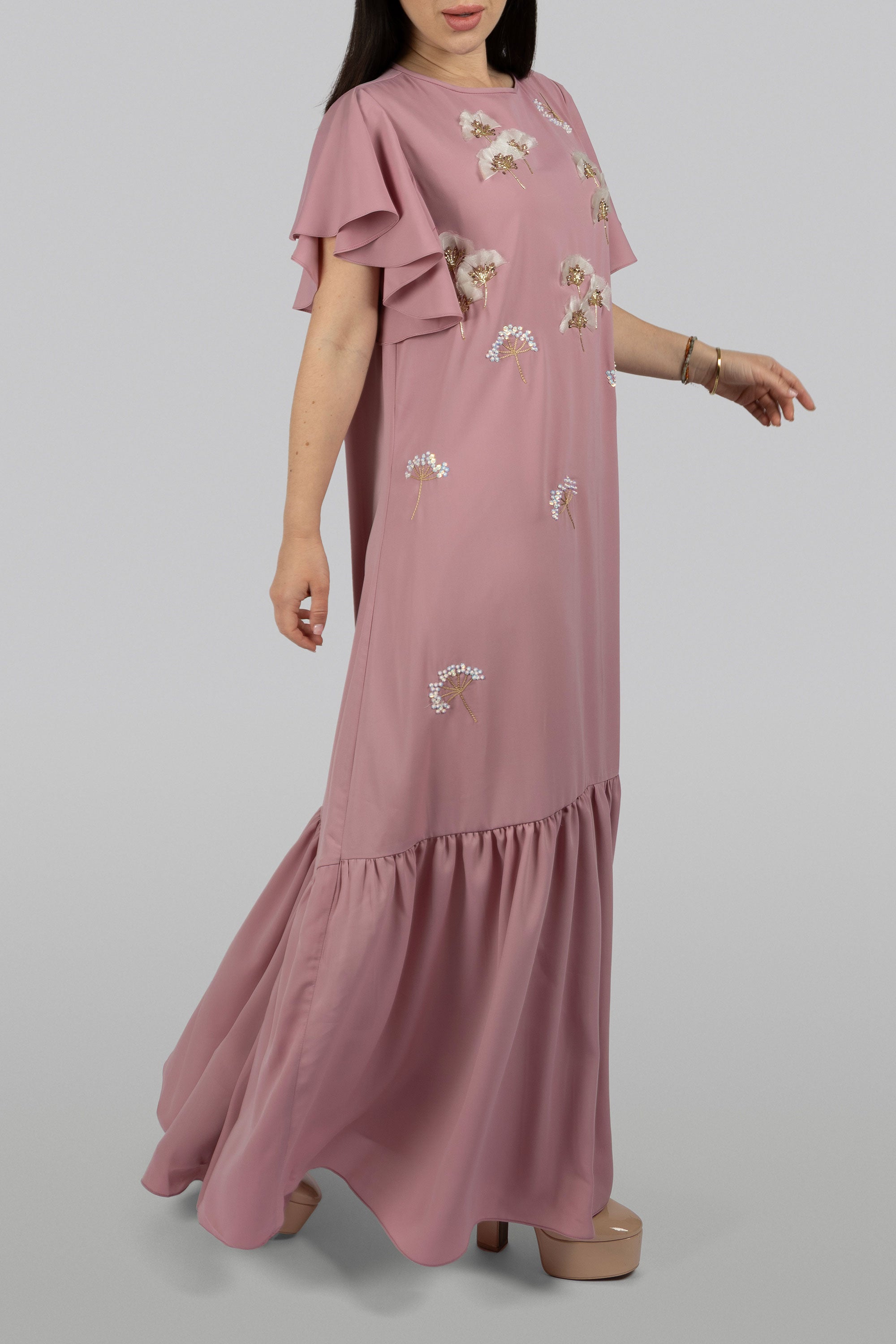 Pink high-low maxi dress with whimsical floral detailing
