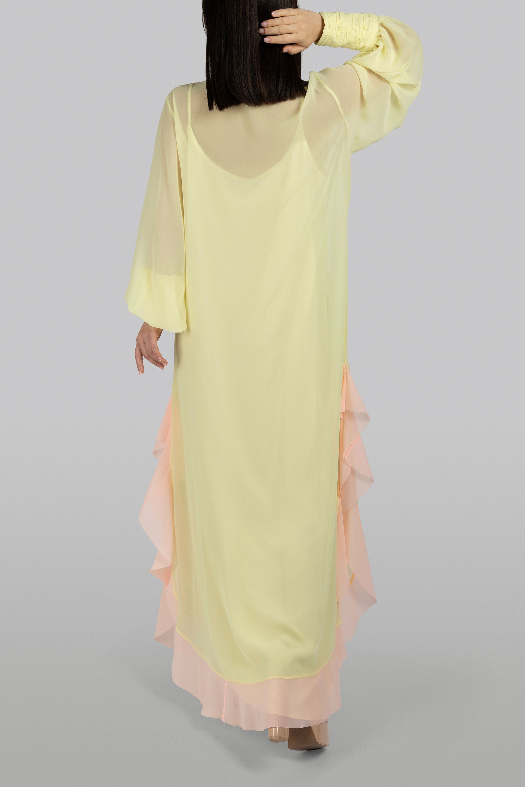 Floral embroidered chiffon maxi dress with shaded pink ruffle accents
