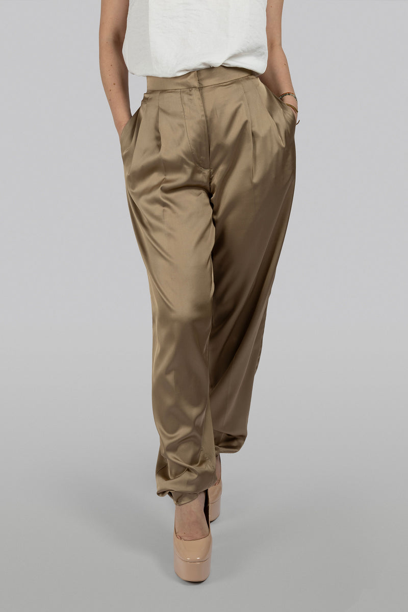 Tan-gold silk tapered pants for polished effortless styling
