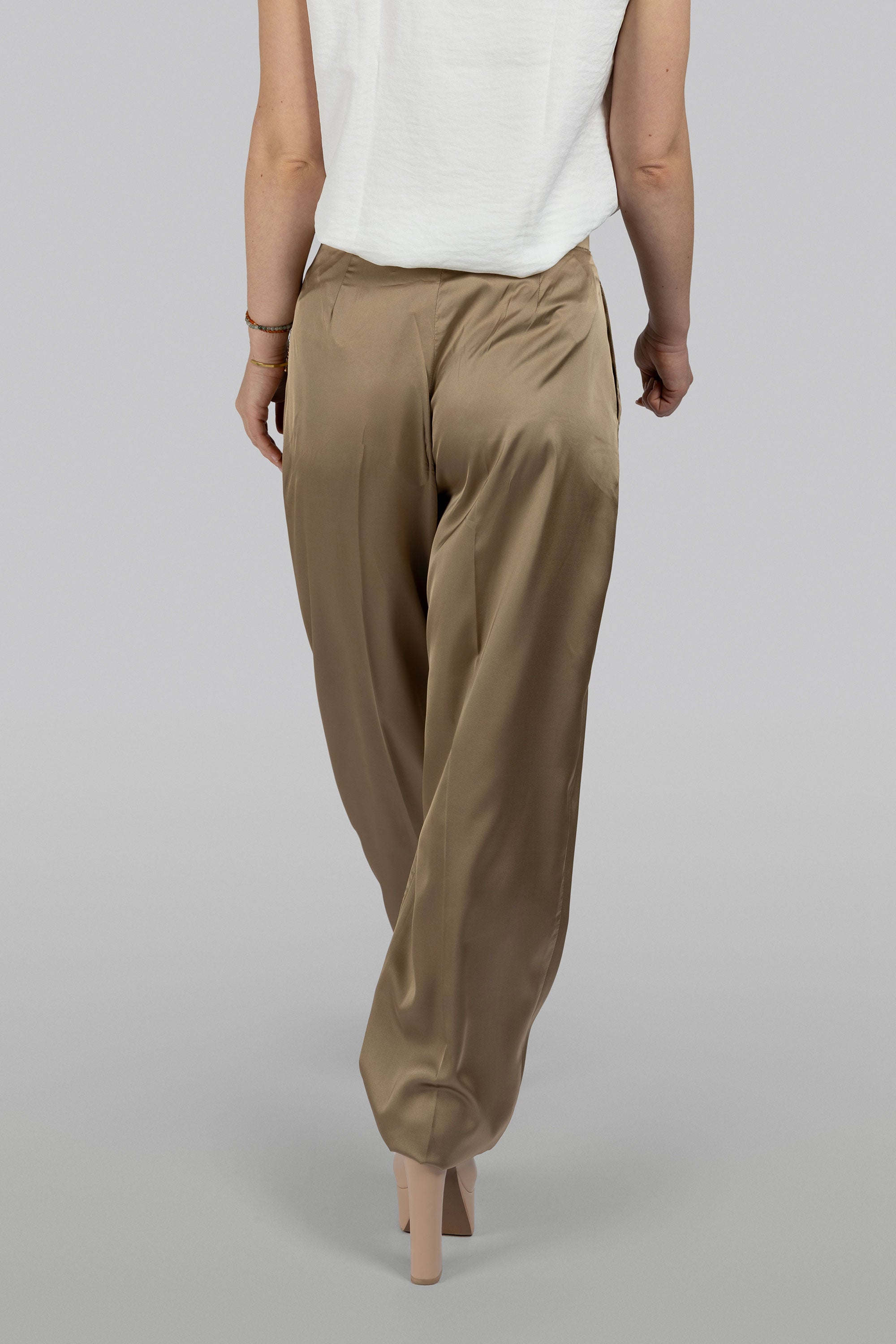 Luxury modest tan-gold silk pants with refined tapered fit
